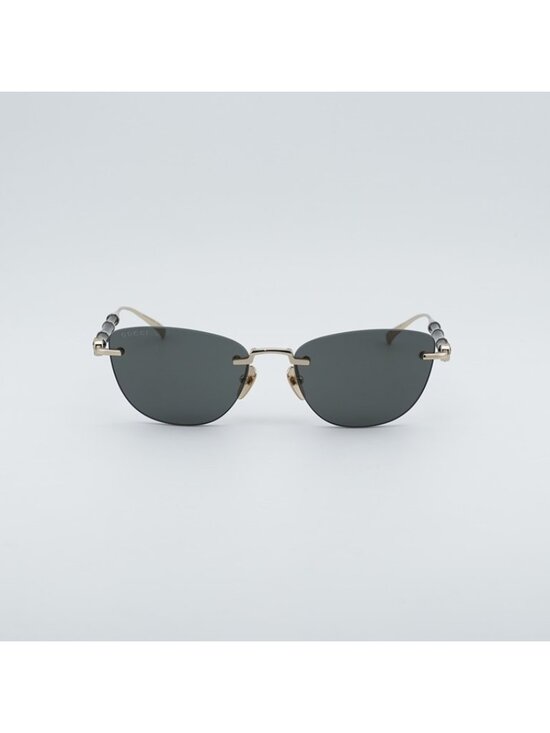 Gucci GG2063S 002 Sunglasses Shiny Endura Gold Cat Eye Frame, Grey Lenses